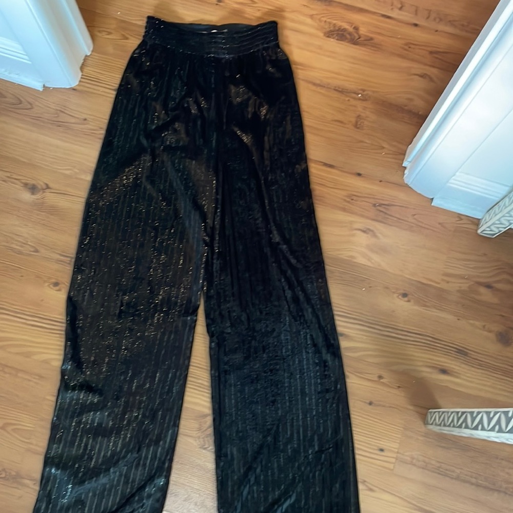 Alice and Olivia black wide leg pants.